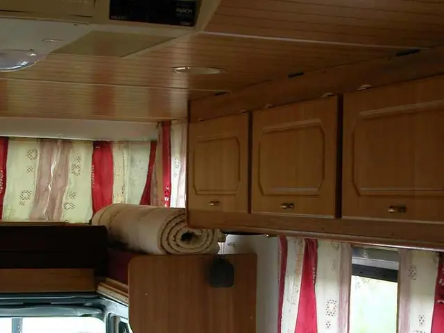 Outdoor kitchen and living room integrated into a Swedish residence