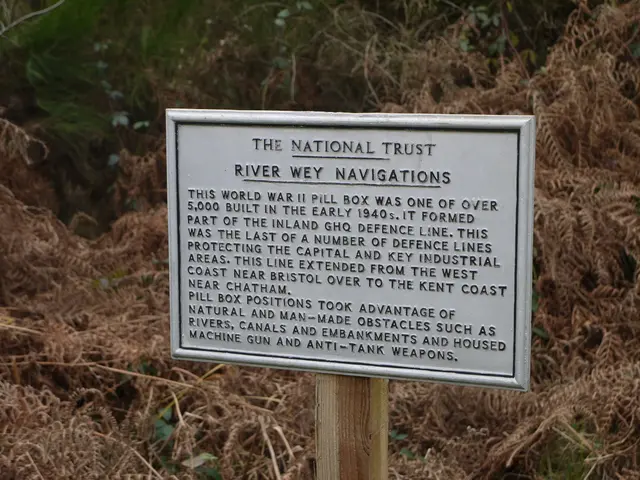 In the picture there is a board attached to a wooden pole, some information is mentioned on that...