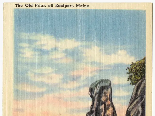 This is a paper. On that there is a painting of water, rocks and sky with clouds. Also something is...